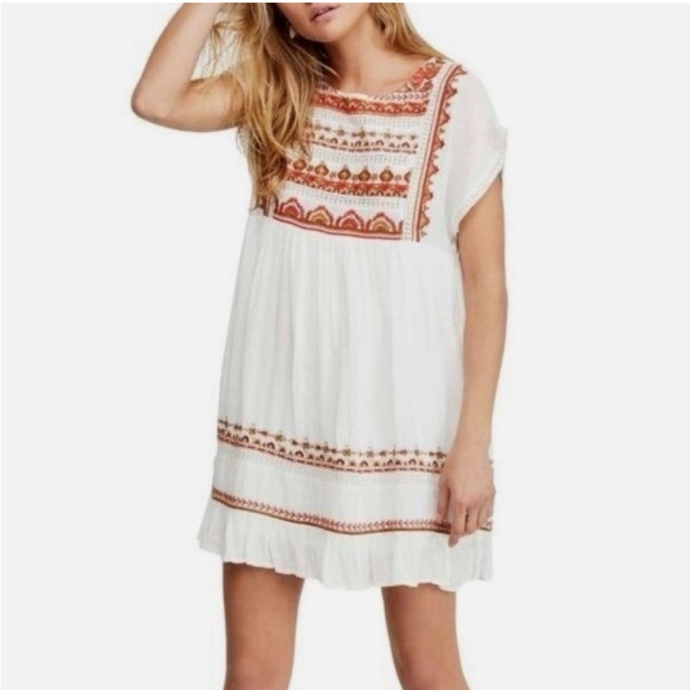 Free People “Sunrise Wanderer” mini tunic dress in white, size Medium.